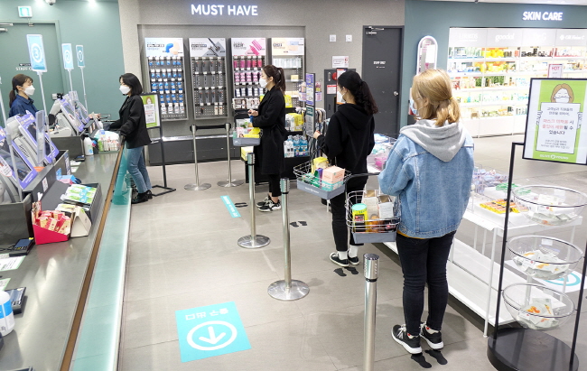 Footprint Stickers Encourage Social Distancing at Checkout Counters