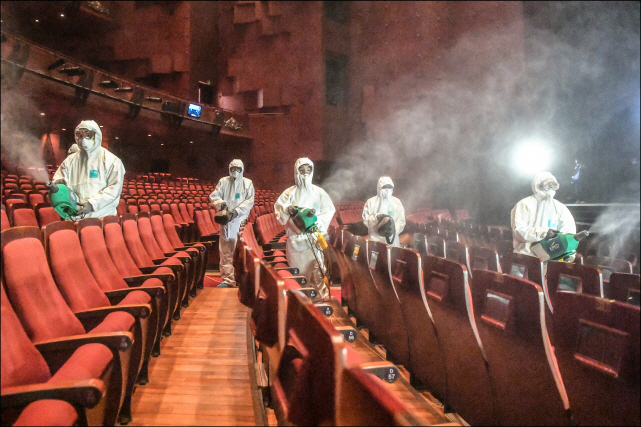 Officials disinfect a concert hall at Sejong Center for the Performing Arts in this photo taken on Jan. 30, 2020, and provided by the center.