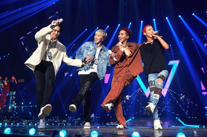 A photo of WINNER during the band's latest world tour, "WINNER Cross Tour," provided by YG Entertainment.