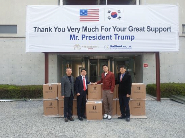 Officials at SolGent, a new coronavirus diagnostic solutions producer, posing for a photo after the South Korean bio firm was registered as a supplier of strategic materials to the U.S. Federal Emergency Management Agency (FEMA). (image: EDGC)