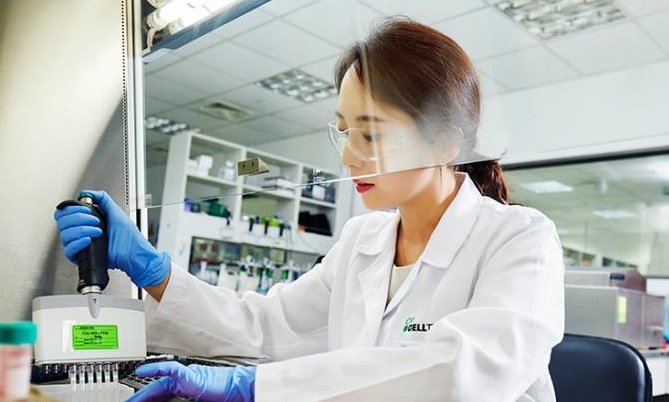 This undated photo, provided by pharmaceutical giant Celltrion Inc., shows a researcher at the company's lab.