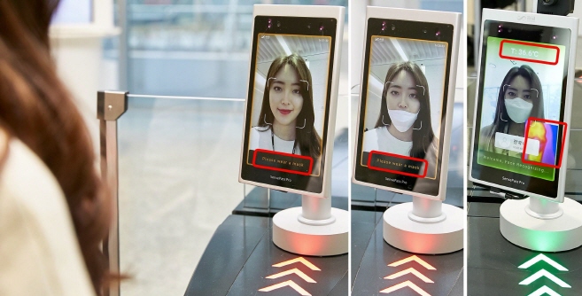This photo, provided by LG CNS Co., shows the company's artificial-intelligence (AI)-based facial recognition entrance gate control system that detects people wearing face masks.