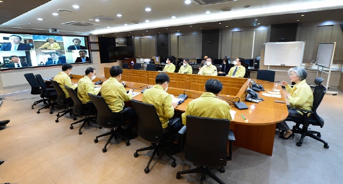 This photo, provided by foreign ministry in Seoul on April 1, 2020, shows a teleconference taking place between Seoul ministry officials, including Foreign Minister Kang Kyung-wha (R), and heads of South Korean diplomatic missions in Africa to discuss coronavirus outbreak situations and anti-virus efforts.