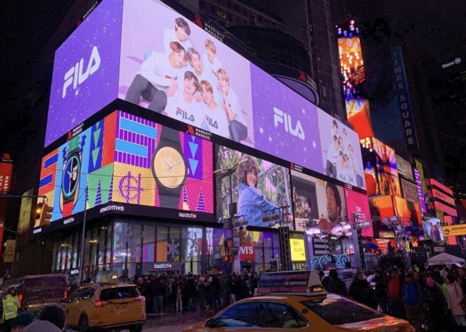 An ad by fashion brand Fila featuring BTS. (image: Fila)