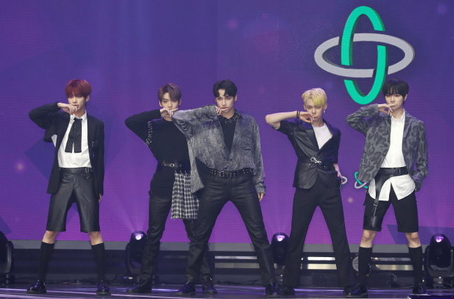 In this file photo, South Korean boy band Tomorrow X Together performs on stage during a showcase for its new EP album, "The Dream Chapter: Eternity," at an arts hall in Seoul on May 18, 2020. (Yonhap)