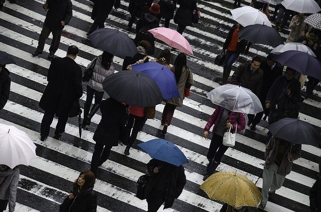 People walk on a street in Osaka, Japan. (image: Pixabay)