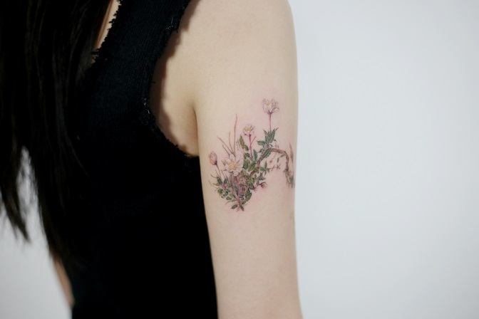 This photo provided by Kim Do-yoon shows a botanical tattoo design by the tattooist. 