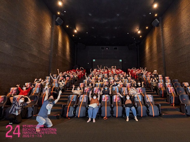 This undated photo, provided by the Bucheon International Fantastic Film Festival, shows the audience at a theater amid the novel coronavirus outbreak.