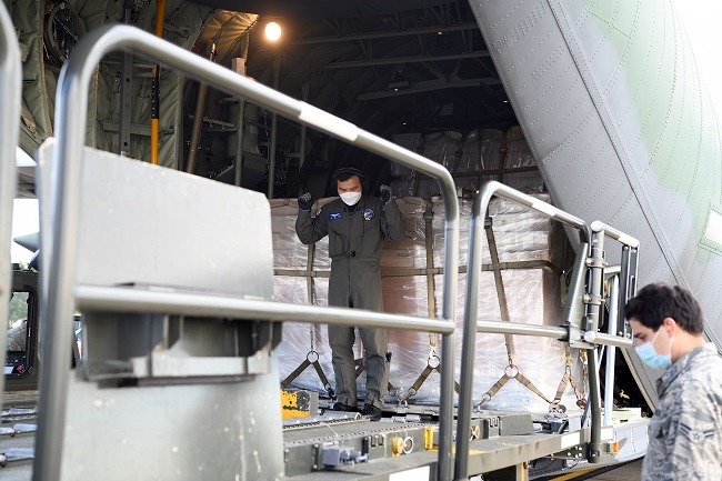 A South Korean Air Force aircraft's cargo of 500,000 face masks is unloaded at Joint Base Andrews, Maryland, on May 12, 2020, in this photo provided by the South Korean Embassy in Washington.