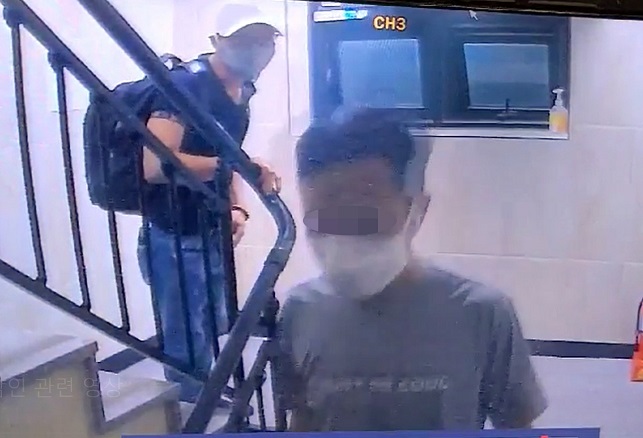 This photo provided by the Gyeonggi Southern Provincial Police Agency shows two of three Vietnamese nationals who escaped from a coronavirus quarantine facility in Gimpo on July 27, 2020.