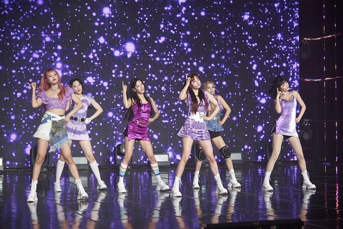 This photo provided by Cube Entertainment on Aug. 3, 2020, shows K-pop girl group (G)I-dle performing on stage at a media showcase in Seoul for its new single album "Dumdi Dumdi."