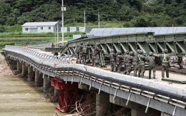 Army Installs Temporary Bridge for Remote Mountain Village Suffering from Flood Damage