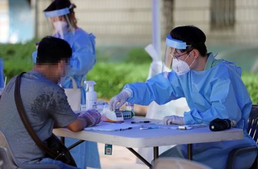 S. Korea Reviews Tightening Social Distancing as New Infections Surge