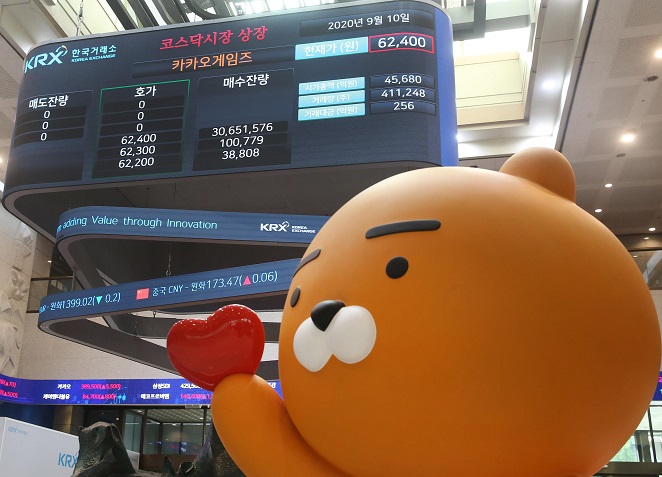 Ryan, a chatting character of South Korea's messenger app Kakao Talk, cheers Kakao Games' listing in the secondary KOSDAQ market on Sept. 10, 2020, in this photo provided by bourse operator Korea Exchange.