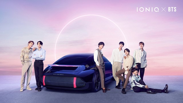 This photo, provided by Hyundai Motor Co. on Aug. 31, 2020, shows K-pop sensation BTS posing for a photo next to the South Korean car maker's EV brand IONIQ.