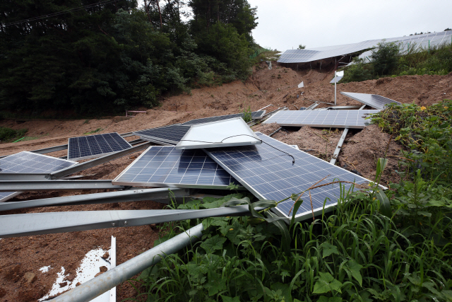 A solar facility set on a mountain slope collapsed in Cheongdo County in North Gyeongsang Province, 325 kilometers southeast of Seoul, on July 3, 2018, shown in this photo provided by the county office. 