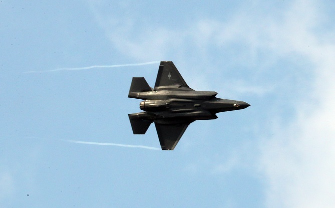 In this file photo, taken on March 4, 2020, an F-35A stealth fighter conducts a flying display during a commissioning ceremony at the Korea Air Force Academy in the central city of Cheongju. (Yonhap)