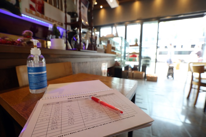 This file photo, taken on Sept. 11, 2020, shows a visitor entry log at a cafe in Seoul. (Yonhap)