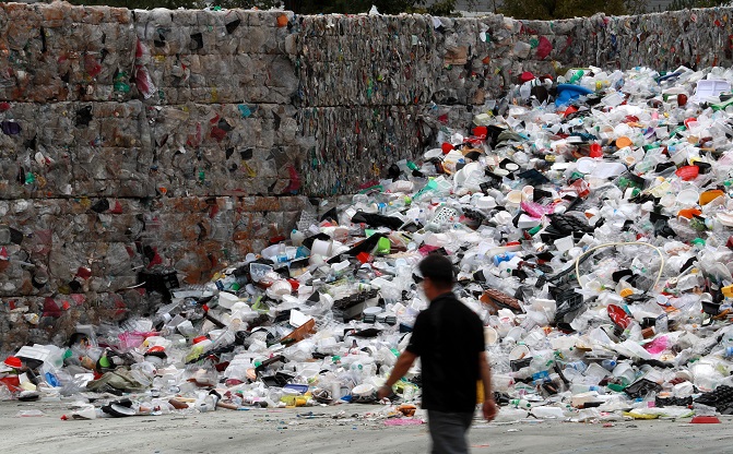 This Sept. 24, 2020, photo shows waste piled up at a city-run recycling center in the southwestern port city of Busan. (Yonhap)
