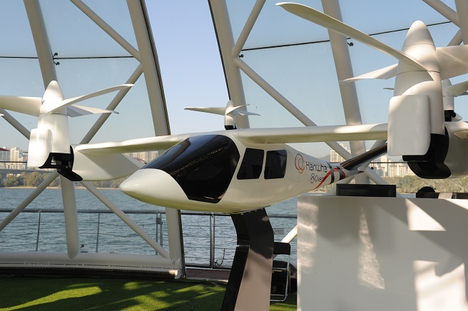 This file photo provided by Hanwha Systems shows the Butterfly, a mockup of the personal air vehicle it is developing with U.S.-based air taxi startup Overair.