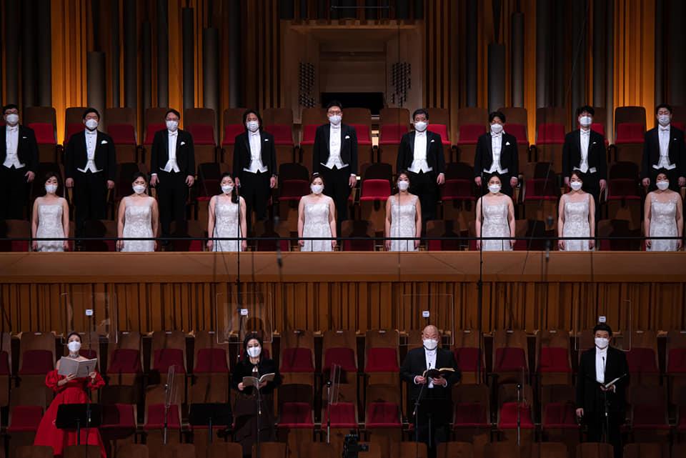 In this photo, provided by the Seoul Philharmonic Orchestra, performers sing, wearing masks, during a livestreamed online concert on Dec. 20, 2020. 