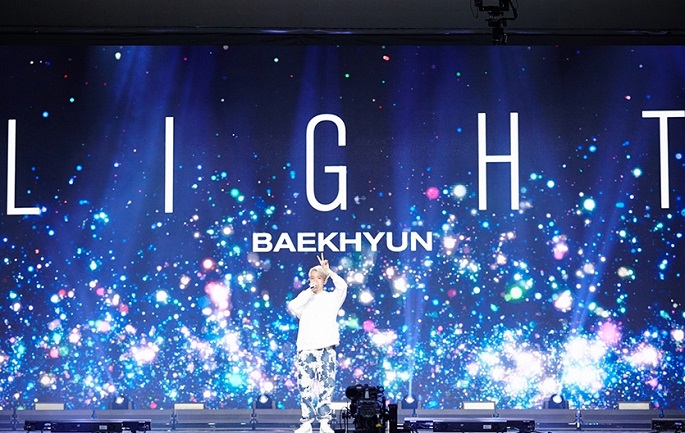 This image, provided by SM Entertainment on Jan. 4, 2020, shows a screenshot from Baekhyun's online concert "Beyond Live - Baekhyun: Light."