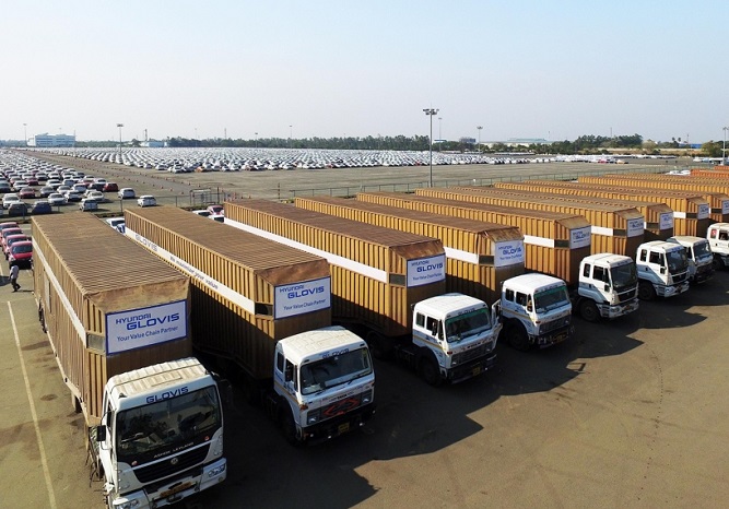 In this undated photo provided by Hyundai Glovis, dozens of trucks are lined up waiting for cargo to deliver at the company's Chennai sales office in India.