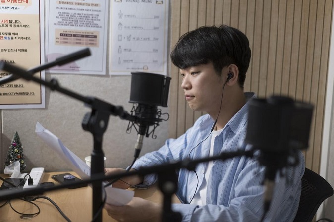 Shin Seon records for his podcast, in this undated photo provided by Shin and The Beautiful Foundation.