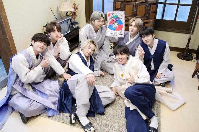 This photo, provided by Big Hit Entertainment on Feb. 11, 2021, shows BTS wearing hanbok in line with the Lunar New Year holiday here. 