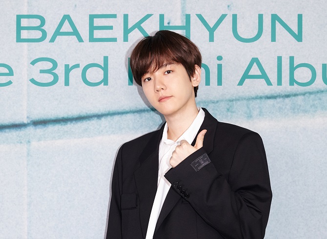 In this photo provided by SM Entertainment, Baekhyun, a member of K-pop boy band EXO, poses for a photo at an online press conference on his new solo EP "Bambi" on March 30, 2021.