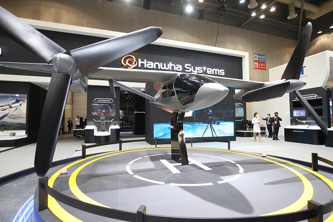 The mock-up of an electric vertical takeoff and landing aircraft called the Butterfly from Hanwha Systems Co. is on display at a defense industry fair held at KINTEX in Ilsan, north of Seoul, on Nov. 18, 2021, in this photo provided by the company. 