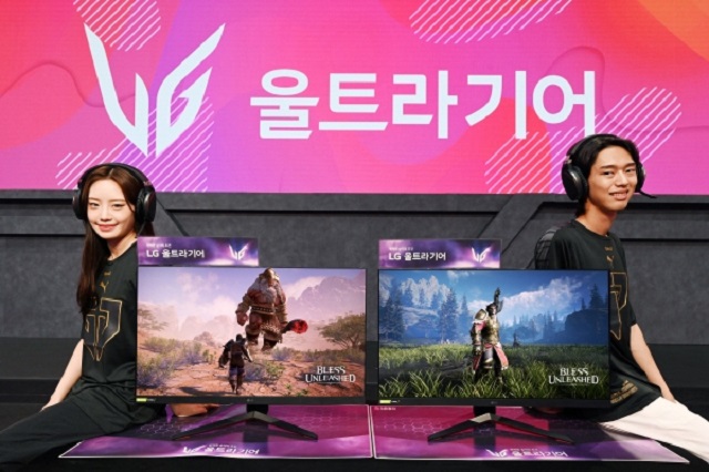 This photo provided by LG Electronics Inc. on May 31, 2021, shows models introducing the company's new 32-inch UltraGear gaming monitor, 32GP850.