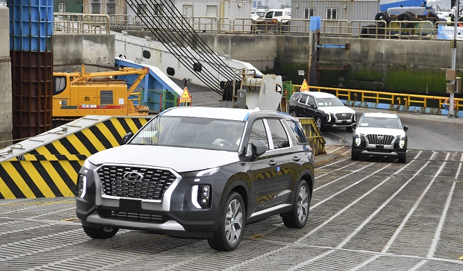 This photo taken on May 15, 2021, and provided by Hyundai Motor shows Palisade SUVs that will be exported to the Democratic Republic of Congo at a port in Pyeongtaek, 70 kilometers south of Seoul.