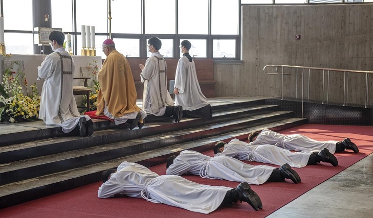 This photo provided by the Catholic Bishops' Conference of Korea shows an ordination ceremony for new priests in Jan. 12, 2021.