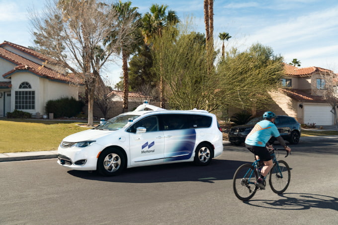 An self-driving vehicle by Motional, a joint venture between South Korean automaker Hyundai Motor Group and U.S. mobility startup Aptiv, conducts a test driving on a road in Las Vegas on Feb. 23, 2021, in this photo provided by Motional.