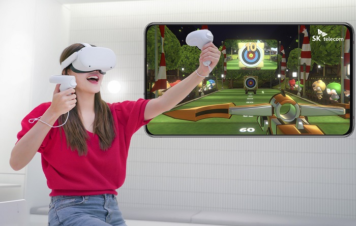 A model plays SK Telecom Co.'s "Crazy World VR" on an Oculus Quest device, in this photo provided by the mobile carrier on June 8, 2021.