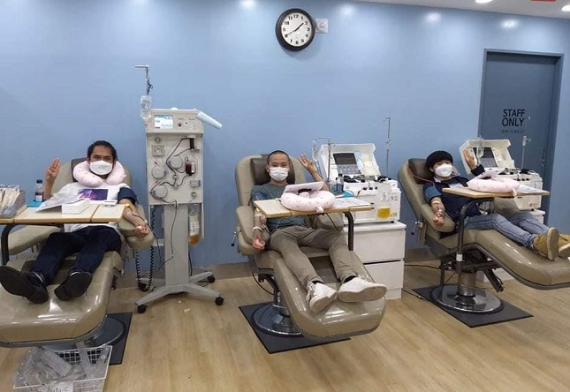 This photo provided by Suwon Migrants Center shows Myanmarese immigrants donate blood at the center in Suwon, Gyeonggi Province.