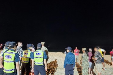 USFK Members who Hold No-mask Parties on Haeundae Beach During Independence Day to be Fined