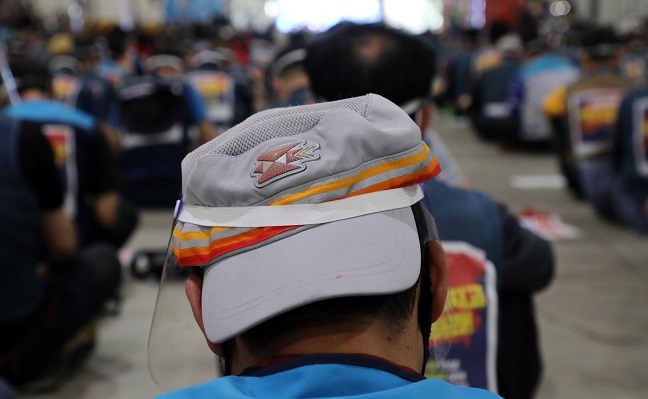 In the June 9, 2021, file photo, couriers participate in a strike demanding better working conditions in Seoul. (Yonhap)