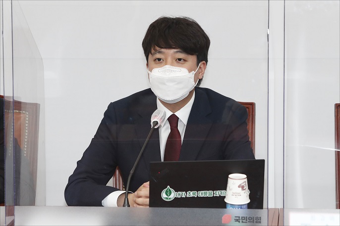 Lee Jun-seok, chairman of the People Power Party, speaks during the party's supreme council meeting at the National Assembly in Seoul on June 14, 2021. (Yonhap)