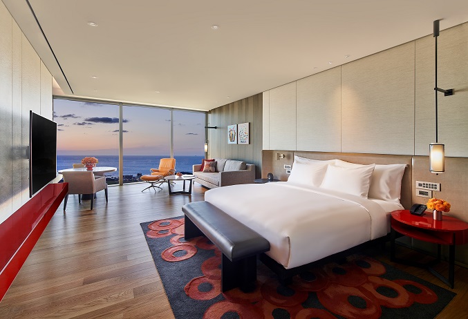 This photo provided by Lotte Tour Development Co. shows a room at the 38-story Grand Hyatt Jeju.