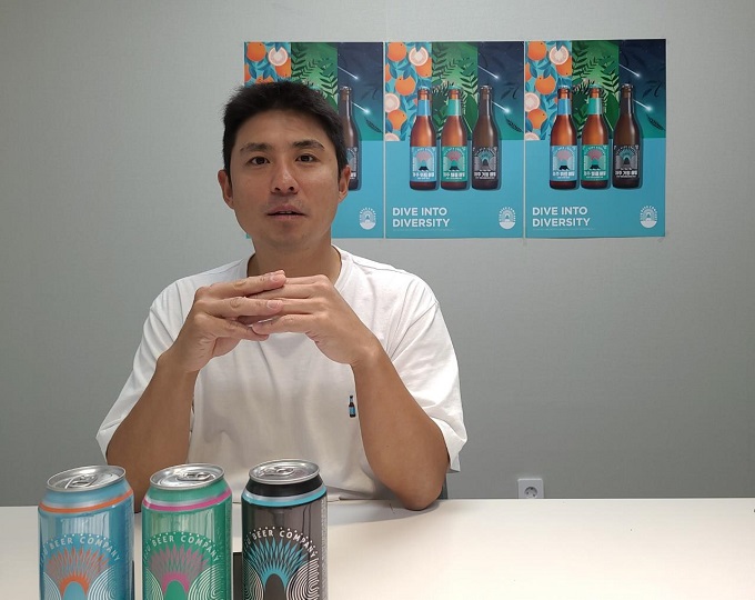 Moon Hyuk-kee, founder and CEO of Jeju Beer, answers questions during an interview with Yonhap News Agency at the company's headquarters in central Seoul on Aug. 30, 2021. (Yonhap)