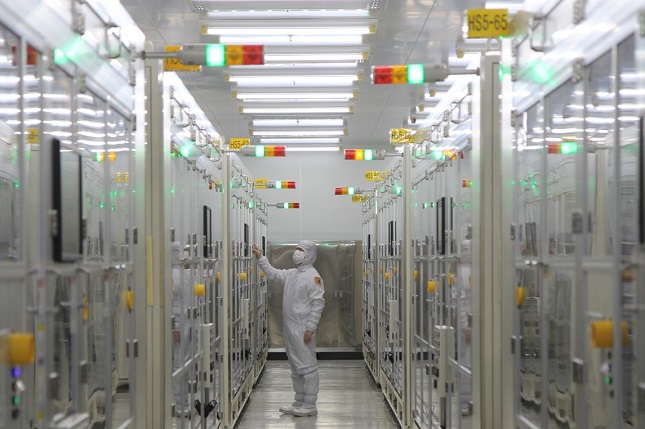 This photo provided by Samsung Electro-Mechanics Co. on Aug. 5, 2021, shows a cleanroom at its plant in Busan.