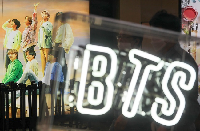 This file photo, taken June 29, 2021, shows an ad poster of BTS at a Lotte Duty Free store in central Seoul. (Yonhap)