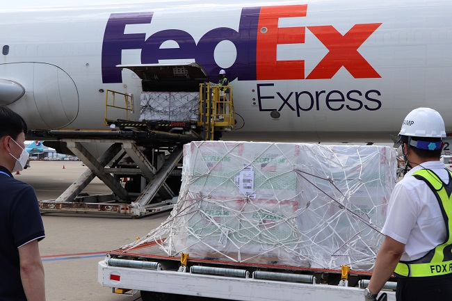 This photo taken Aug. 16, 2021, and provided by health authorities, shows Janssen vaccines arriving at Incheon International Airport, west of Seoul, from the United States.