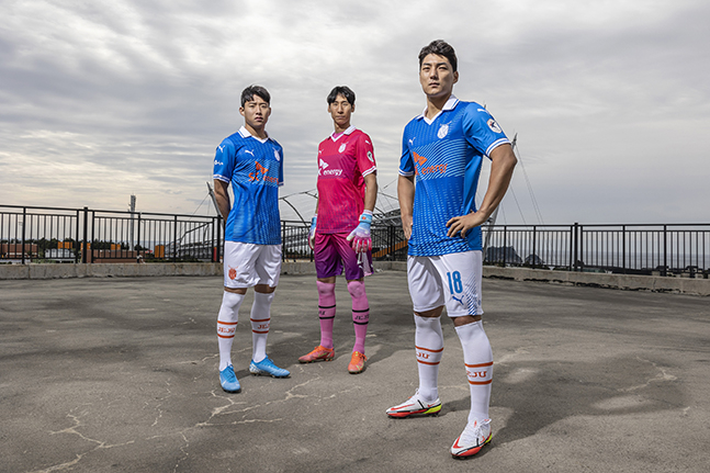 This photo provided by Jeju United shows the team's new football uniforms made by recycling plastic.
