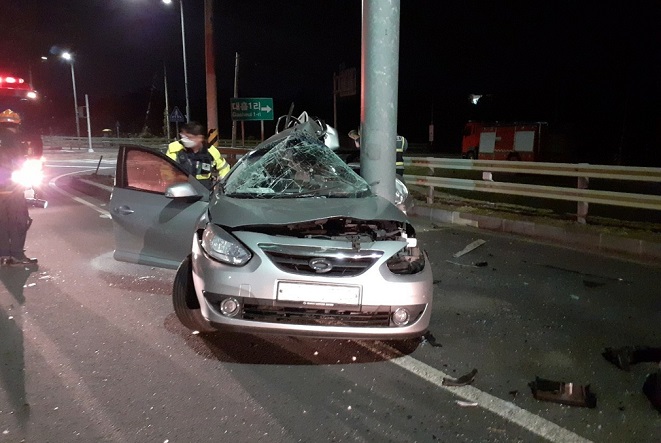 This file photo, provided by the fire authority of the southern Jeju Island, shows a car that crahsed into a traffic pole on Nov. 6, 2020. The car was known to have been driven by an unlicensed 18-year-old.