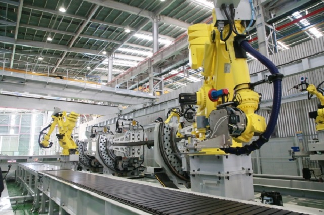 This photo provided by Samsung Engineering Co. shows its steel frame manufacturing robot.