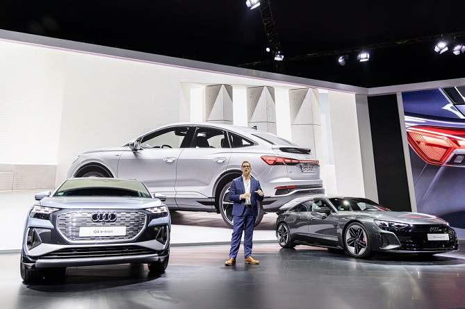 This Nov. 25, 2021, photo offered by Audi shows Executive Director Jeff Mannering, in charge of Audi's South Korean operations, giving a briefing on the German carmaker's EV plans in South Korea during the Seoul Motor Show.