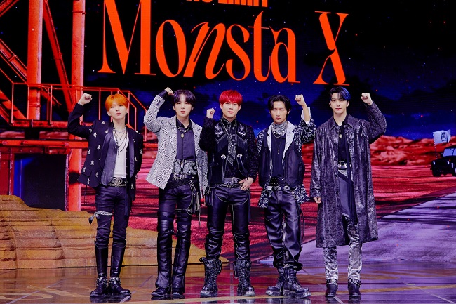 This photo provided by Starship Entertainment shows boy band Monsta X posing for photos during a media showcase for the group's new mini album "No Limit" streamed online on Nov. 19, 2021.